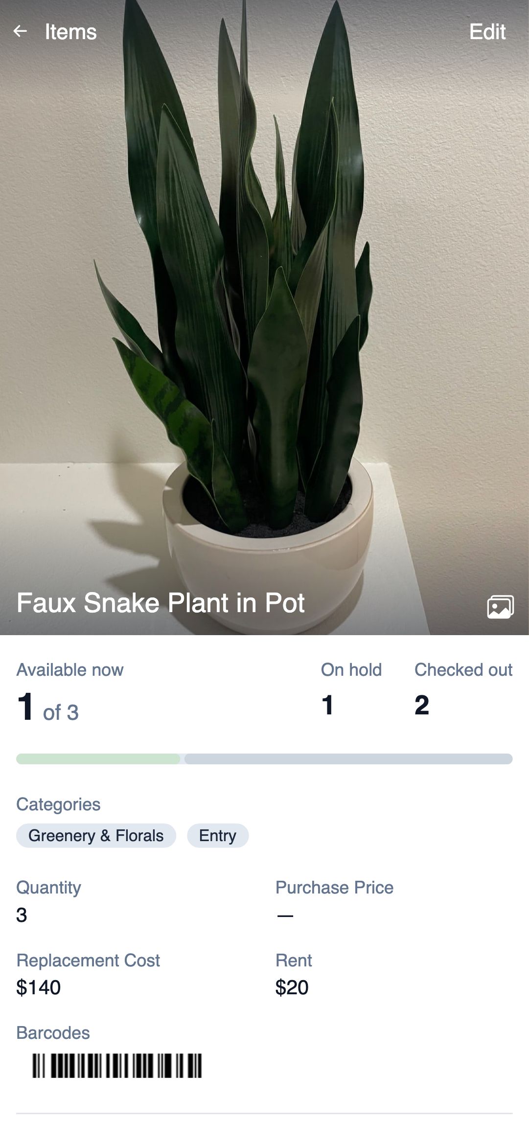 An item on a phone: a photo of a boucle swivel chair, an Edit button, the counts available, on hold, and checked out, then quantity, purchase price, replacement cost, rent, and a barcode