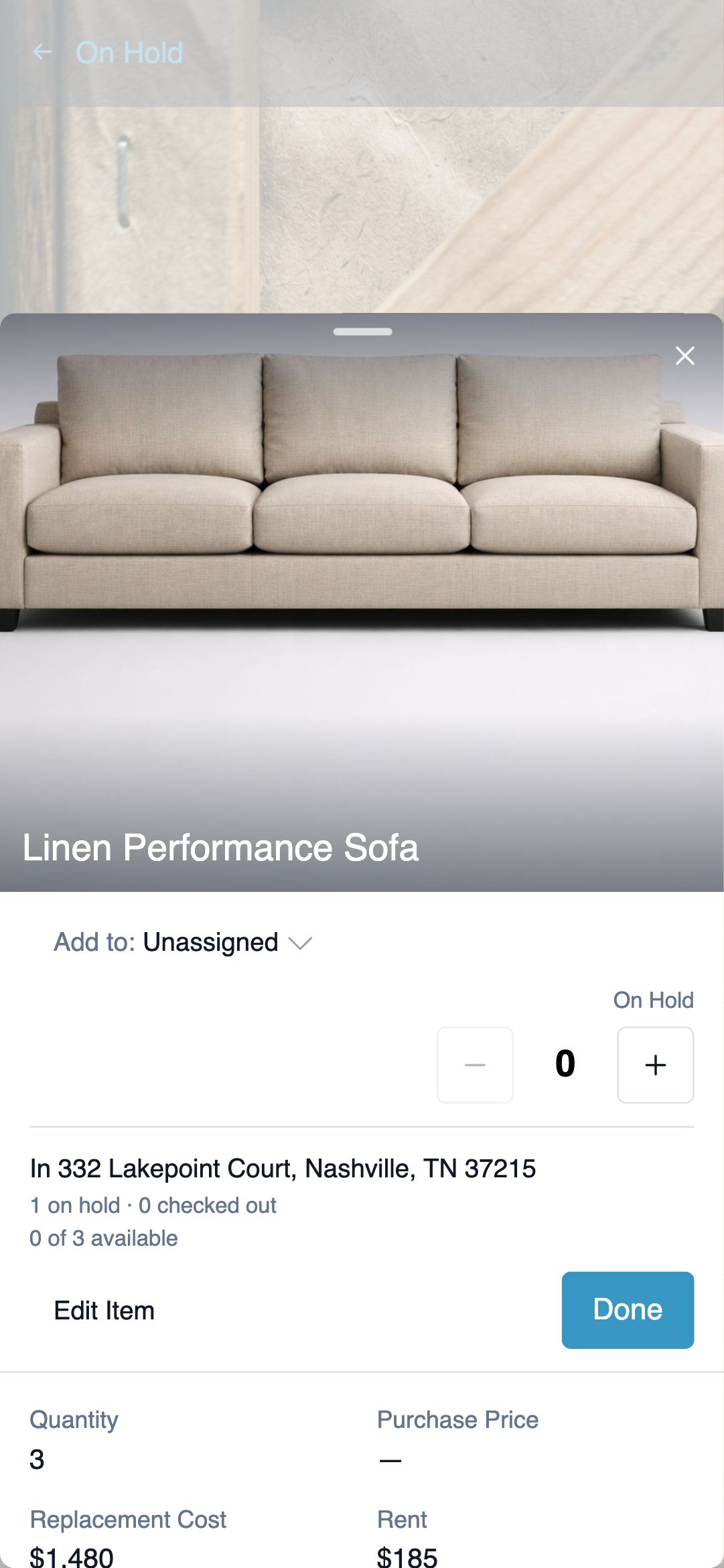 Mobile scan-confirm bottom sheet inside a house's Scan Barcodes flow: recognized item photo and name, Add to room selector defaulted to Unassigned, On Hold stepper, and a Done button