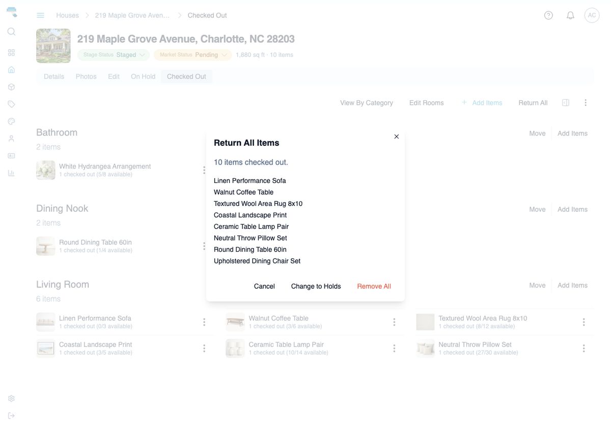 Return All Items dialog listing the items checked out for a house, with Cancel, Change to Holds, and Remove All actions